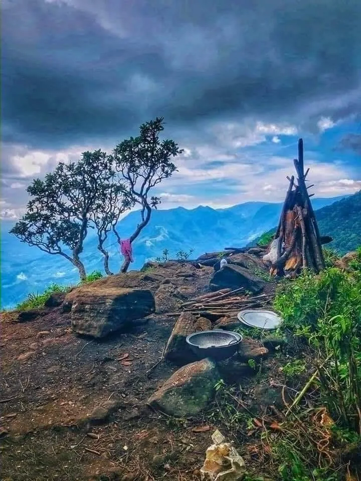 A mountain-top camp looks out over the layered hills of Sri Lanka.