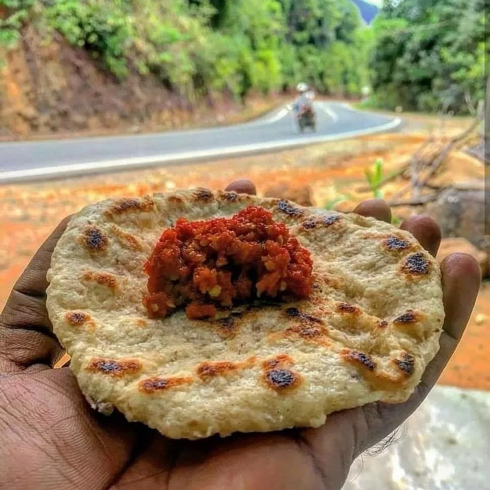Freshly made roti with a spicy filling makes a relaxed roadside snack.