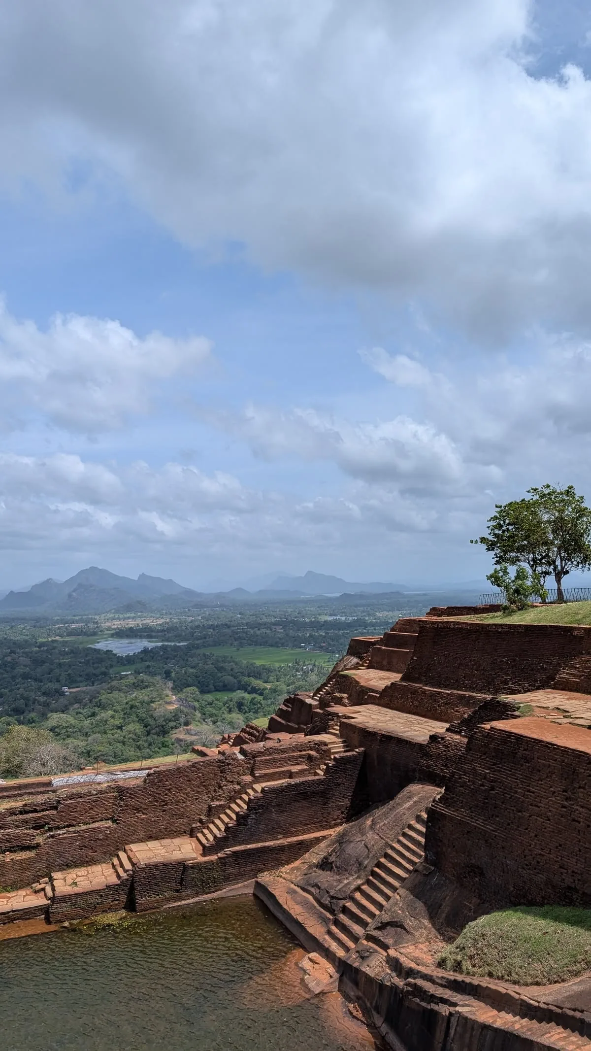 A wide view of the forests and plains from the summit of Sigiriya Rock.